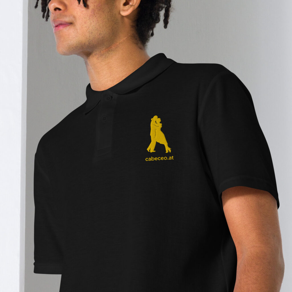 unisex-pique-polo-shirt-black-zoomed-in-64f777609b40a.jpg Volcada - Tango Piqué-Poloshirt Herren