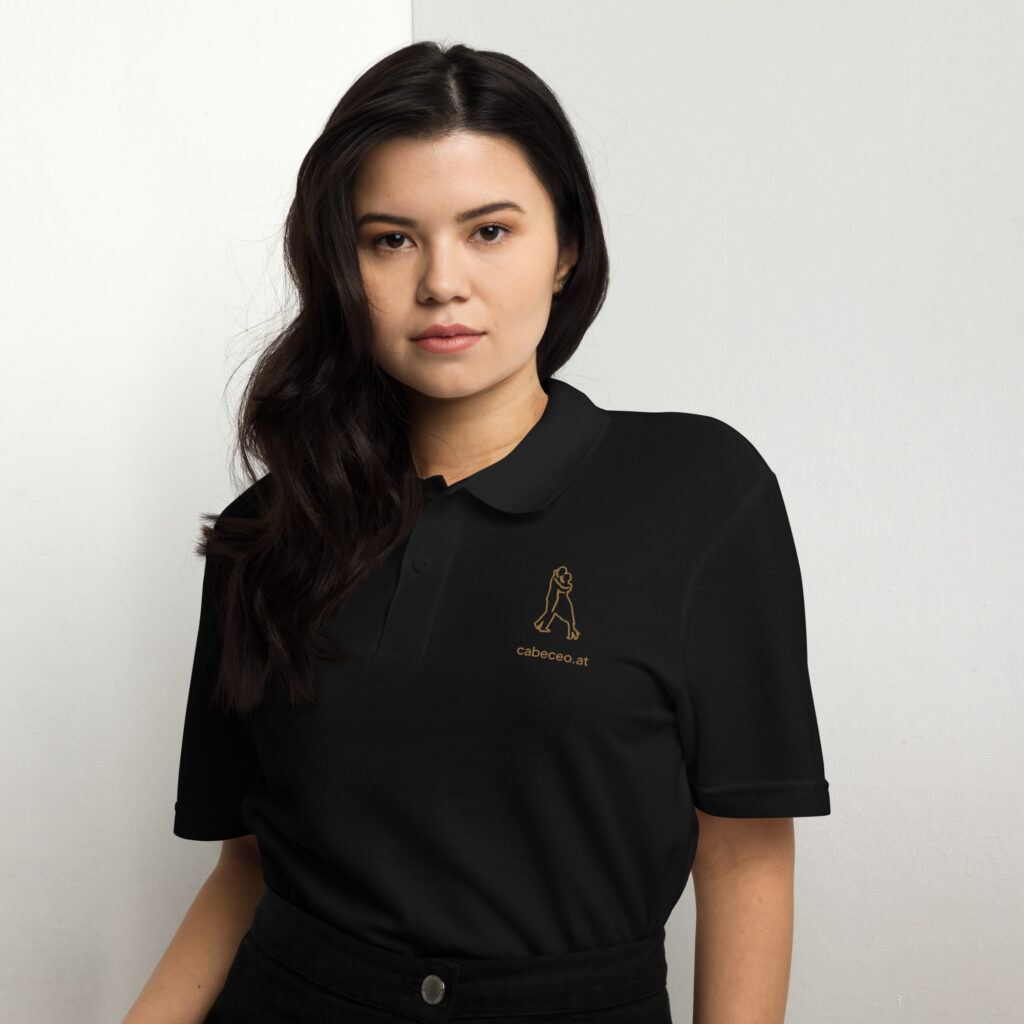 unisex-pique-polo-shirt-black-front-65f34d0ce1e7a.jpg Volcada Kontur – Tango Piqué-Poloshirt
