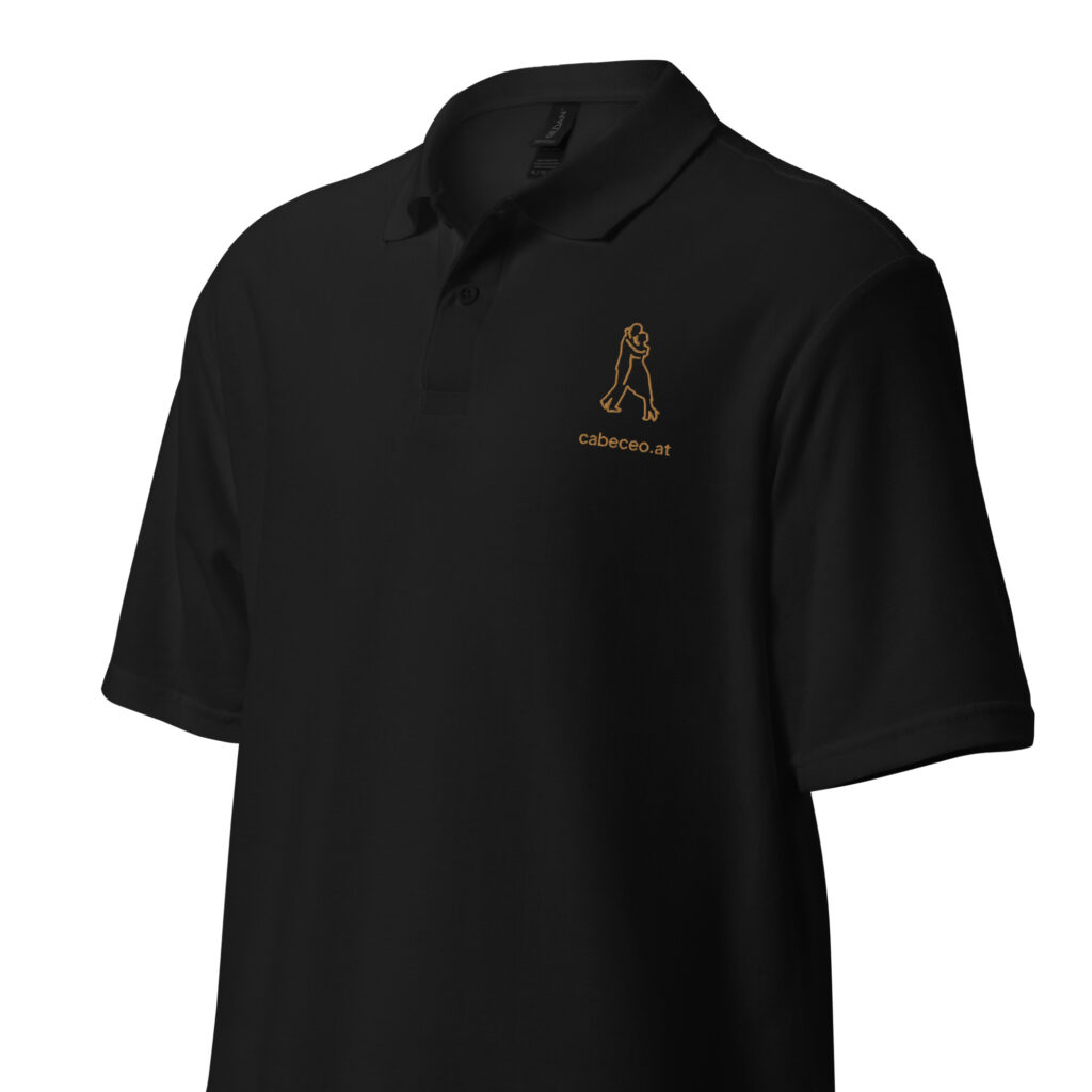 unisex-pique-polo-shirt-black-left-front-65f34d0ce1f62.jpg Volcada Kontur – Tango Piqué-Poloshirt